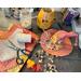My work space with the items I use to make the custom witch hats. It includes fabric reminents, maple leaves and botanical berries.